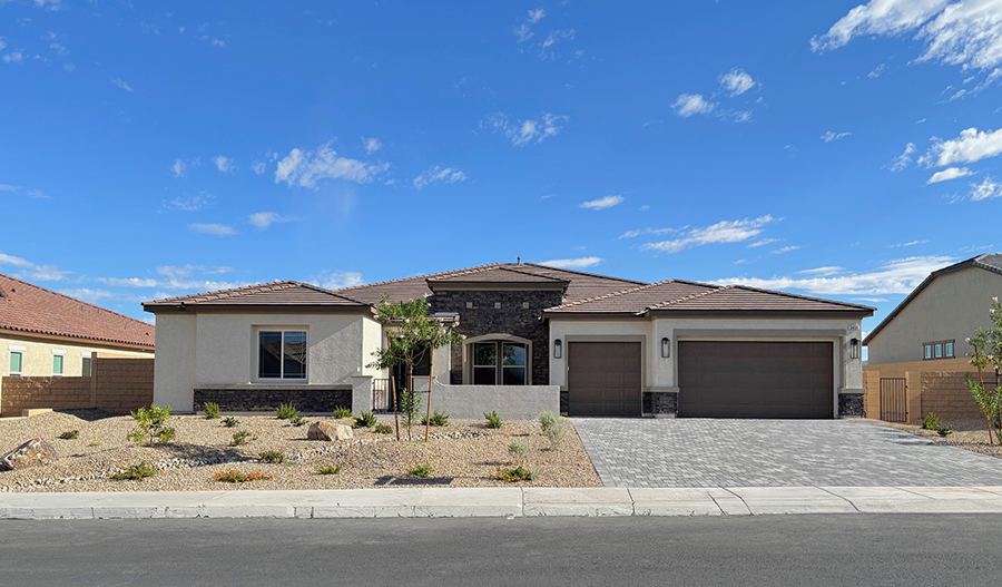 Ranch-style home at Newbridge Las Vegas with beautiful desert landscaping, energy-efficient design, and single-story convenience